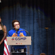 US First Lady Jill Biden (R) and high school track athlete Maya Mosley (L) listen to tennis legend Billie Jean King speak during an event to mark the 50th anniversary of Title IX at Capitol One Arena in Washington, DC, on June 22, 2022.